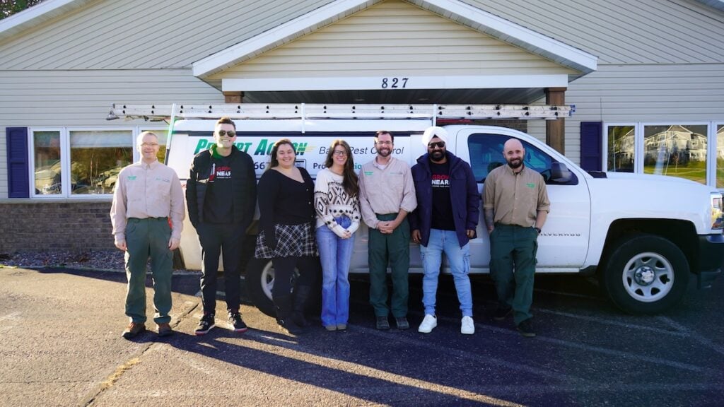 Prompt action group photo outside in front of van